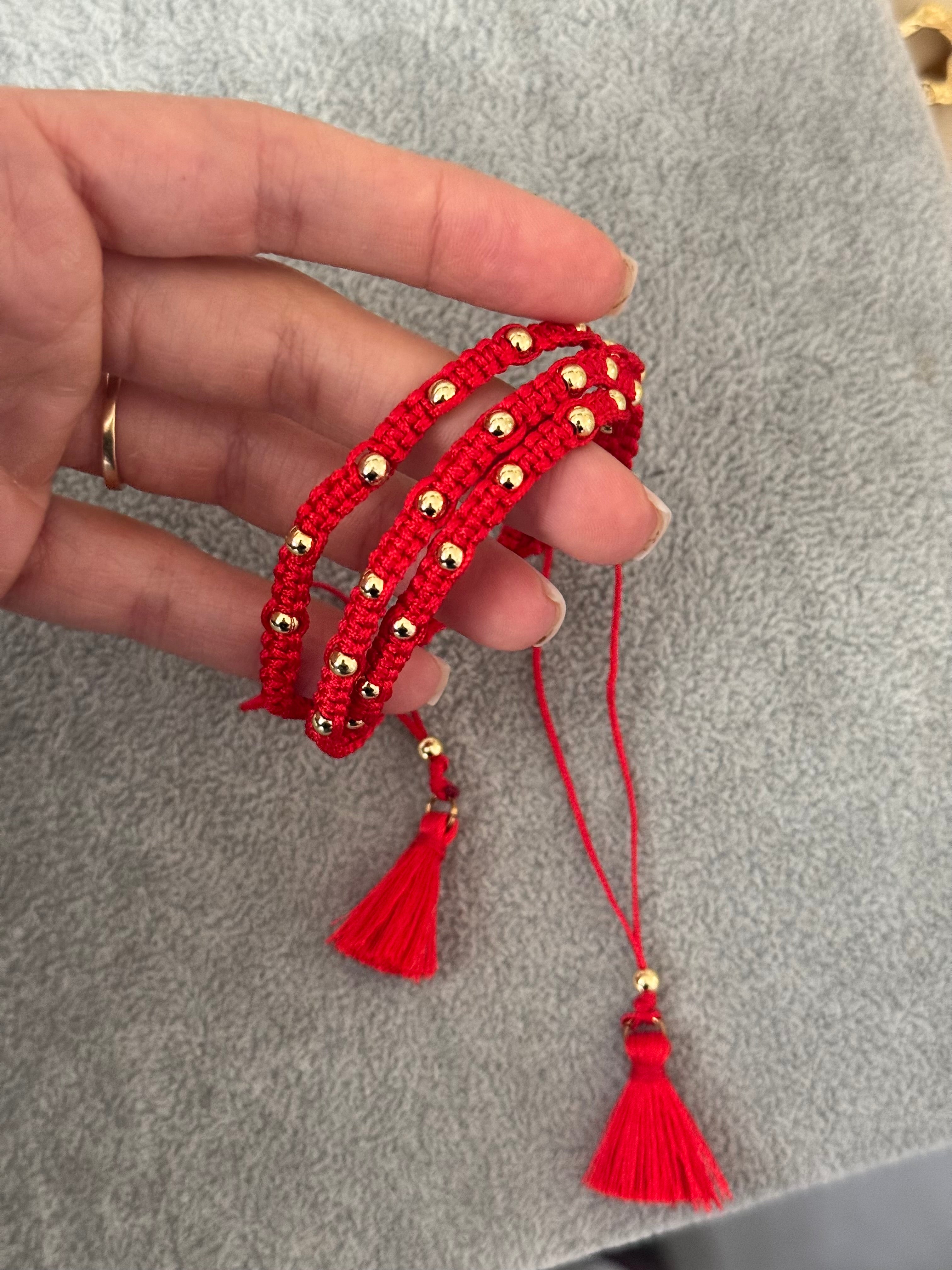 Trío de pulseras rojas