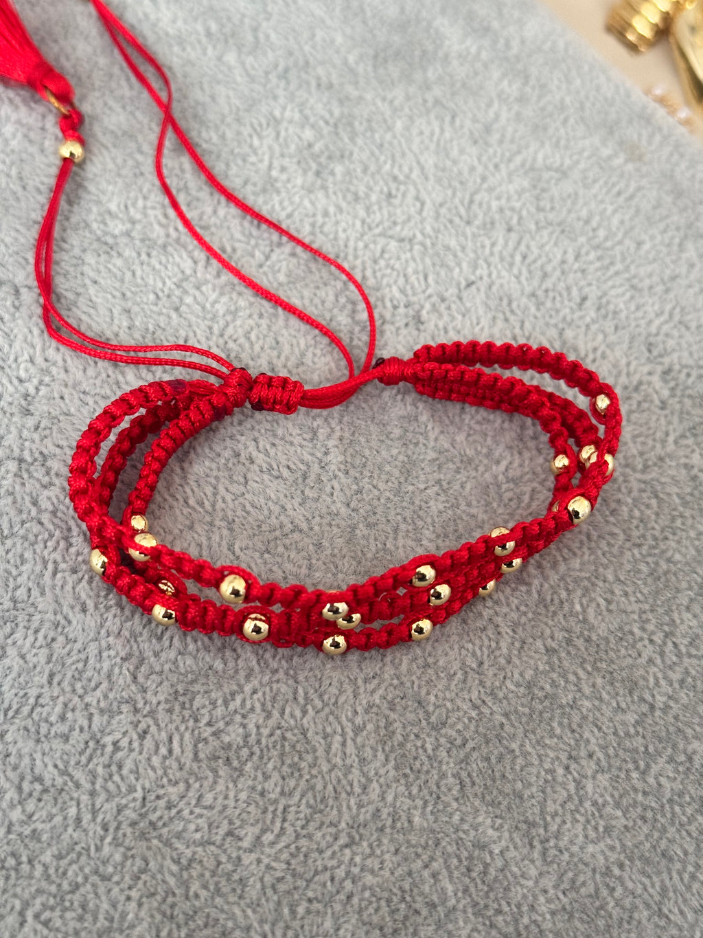 Trío de pulseras rojas