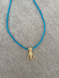 Collar Virgen del Valle de mostacillas calibradas