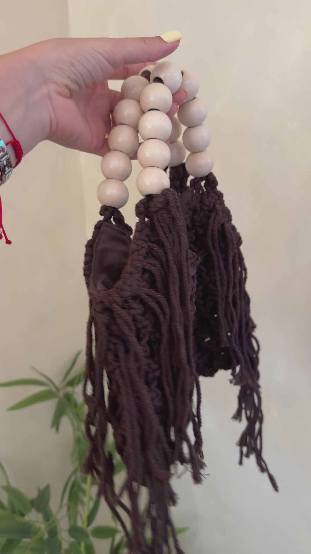 Bolso de mano tejido marrón